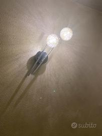 Applique in metallo e vetro