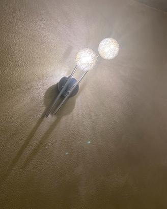 Applique in metallo e vetro