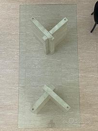 Tavolo di cristallo con gambe in travertino