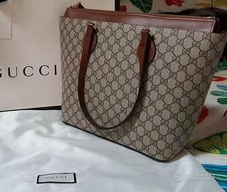 DUE  BORSE GUCCI E LOUIS VUITTON