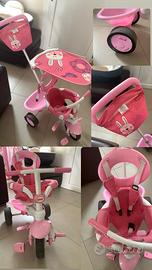 Triciclo fisher price rosa con tettuccio