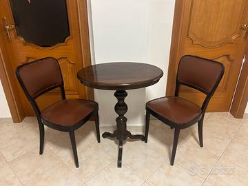 Tabolino ovale più sedie