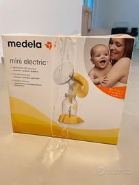Medela mini electric tiralatte con due bottiglie