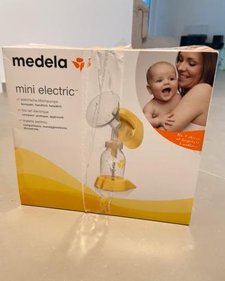 Medela mini electric tiralatte con due bottiglie