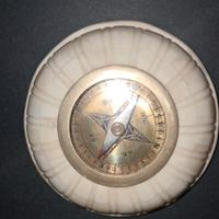 Bussola vintage in osso o .....