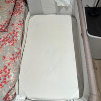 Next to me coo-slepping chicco