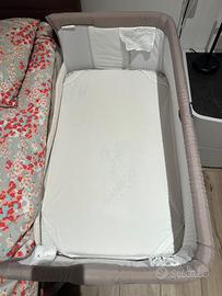 Next to me coo-slepping chicco