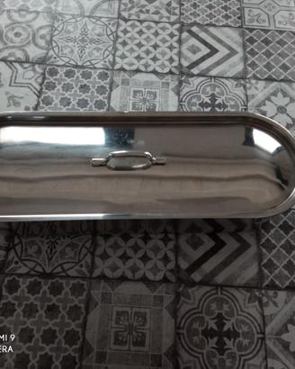 Pentola in acciaio inox per cucinare il pesce.