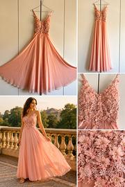 Abito lungo rosa cipria con corpetto floreale