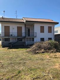 Immobile con terreno edificabile