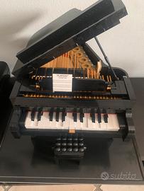 Lego pianoforte e logo rolling stone