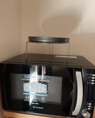 microonde cmxg25dcb candy usato