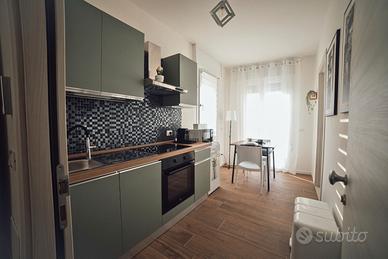 Suite bilocale con cucina e terrazzo