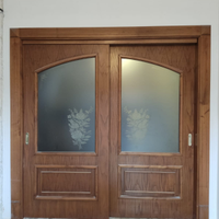 Porta scorrevole con vetrata