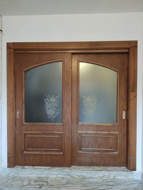 Porta scorrevole con vetrata