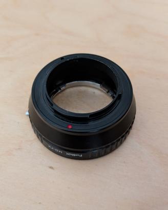 Adattatore Fotodiox MD-FX per obiettivi Minolta MD