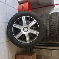 4 cerchi in ferro completi di copricerchio