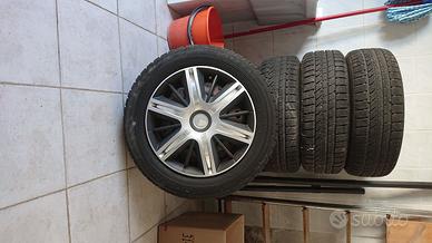 4 cerchi in ferro completi di copricerchio