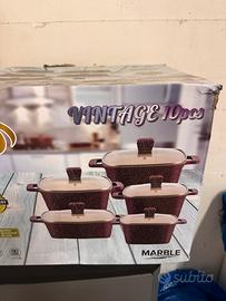 Set di pentole antiaderenti marmorizzate.