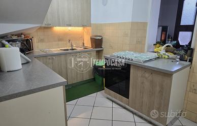 Casa a schiera con giardino privato e doppio garag
