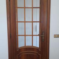 Porta da interno ad arco in noce