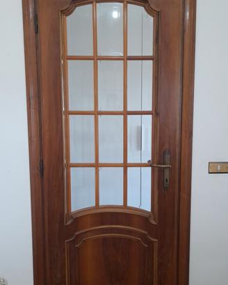 Porta da interno ad arco in noce