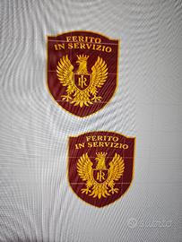 Coppia di spille ferito in servizio