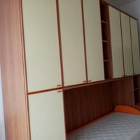 Armadio a ponte con letto singolo
