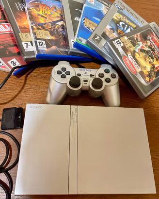 PlayStation 2 Slim Silver + 8 giochi (Tekken ecc.)
