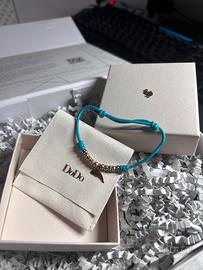 Bracciale Dodo con ciondolo delfino in oro rosa 9K