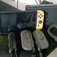 Nintendo Switch + 4Joypad + supporto TV + 4 Giochi