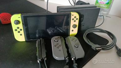 Nintendo Switch + 4Joypad + supporto TV + 4 Giochi