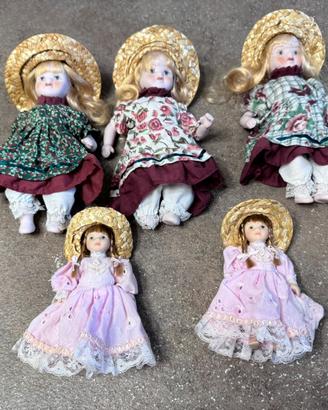 5 bambole in ceramica piccole