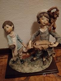 statuetta in ceramica - ragazzi