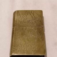 accendino in ottone. 