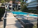 villetta-a-schiera-con-giardino-e-piscina