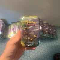 Mini Tin evoluzioni Prismatiche Umbreon