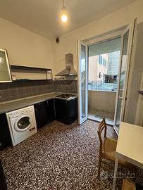 Coronata appartamento con giardino