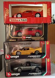 modellini 1/18 Ferrari Lambo Mercedes mai staccati