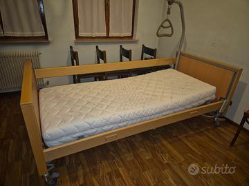 Letto ortopedico elettrico Invacare + materasso