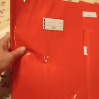 Dieci copertine rosse per quaderni 