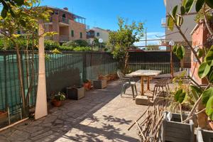 Appartamento trilocale con giardino