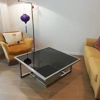 Tavolino da salotto cromato con vetro fumè