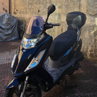 Scooter 125 kymko con bauletto