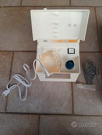 Apparecchio per aerosol