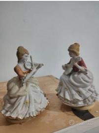 Statuine porcellana con Carion