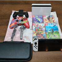 Nintendo switch oled + 5 giochi + Cover +Joystick 