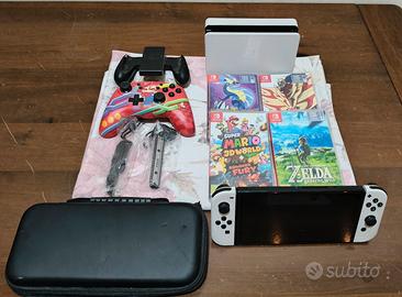 Nintendo switch oled + 5 giochi + Cover +Joystick 