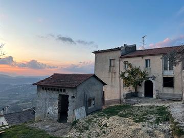 Rustico con terreno edificabile
