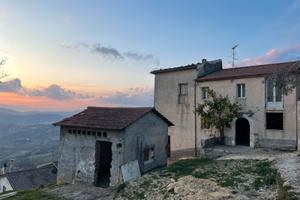 Rustico con terreno edificabile